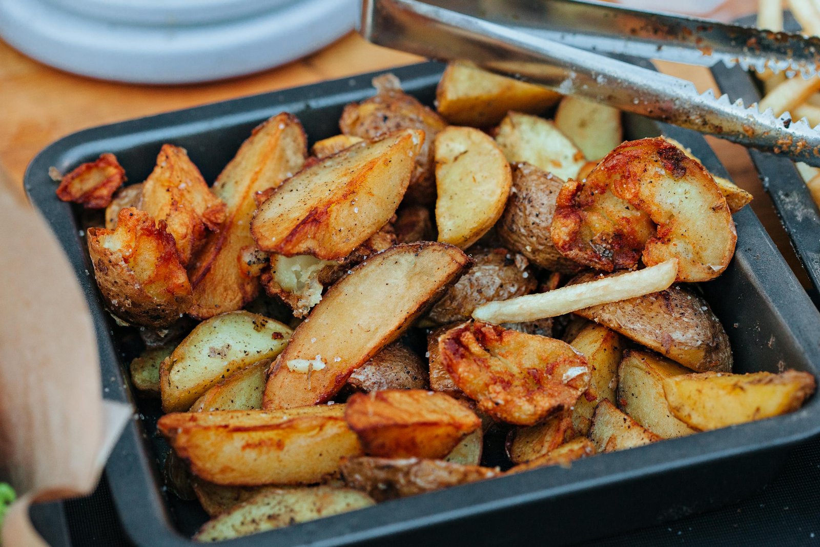 Baked french fries with crispy texture, perfect for a tasty side dish.