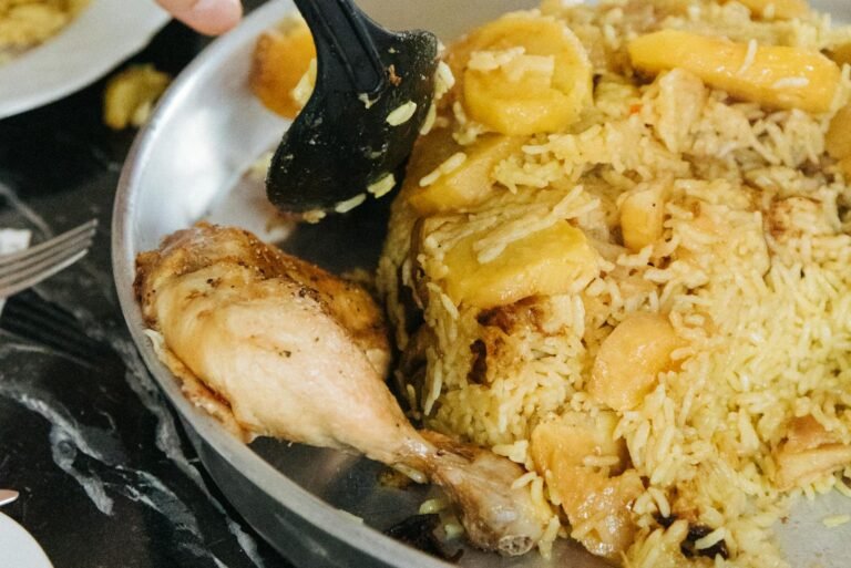Potatoes in biryani? Close-up of a traditional biryani dish served in a wok